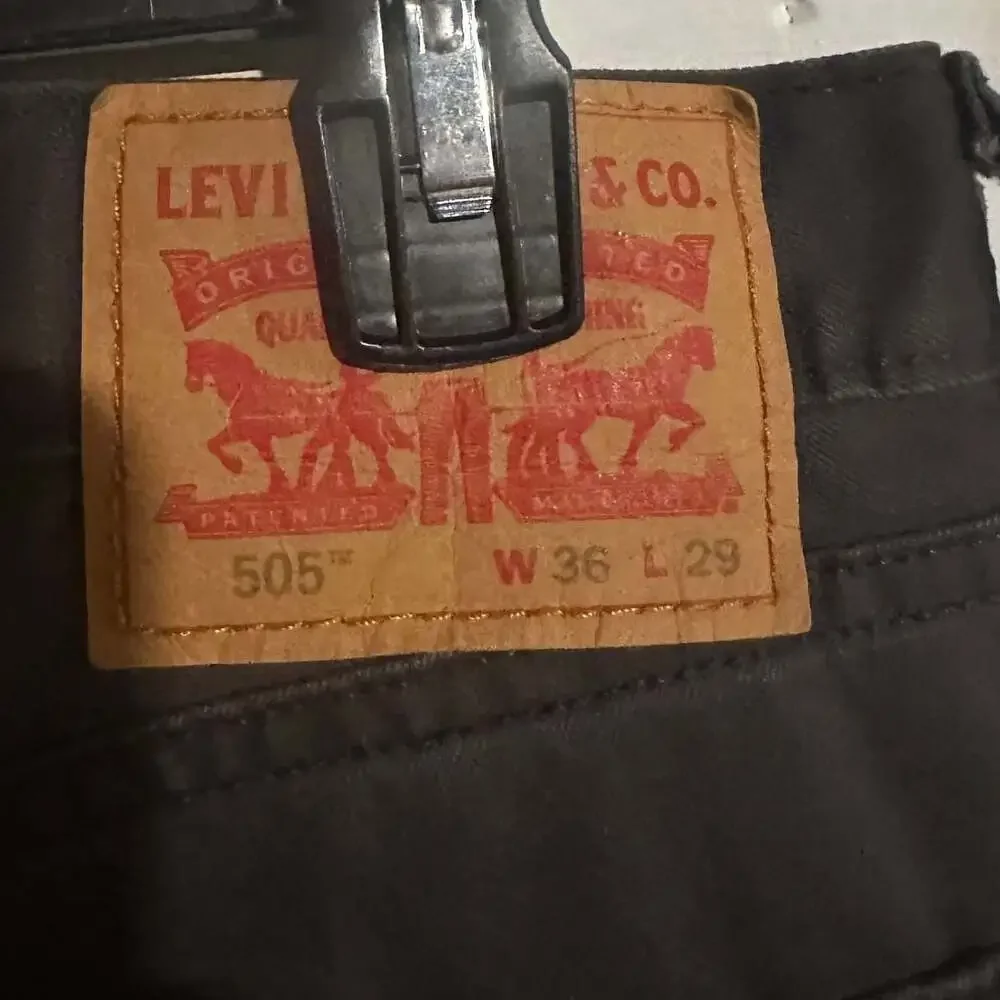 Levi's Men's 505 Regular Fit Straight Leg Jeans in Black Vintage